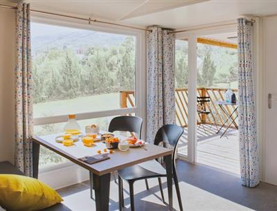Cottage Pacifique - Dining area - Campsite La Roseraie *** La Baule
