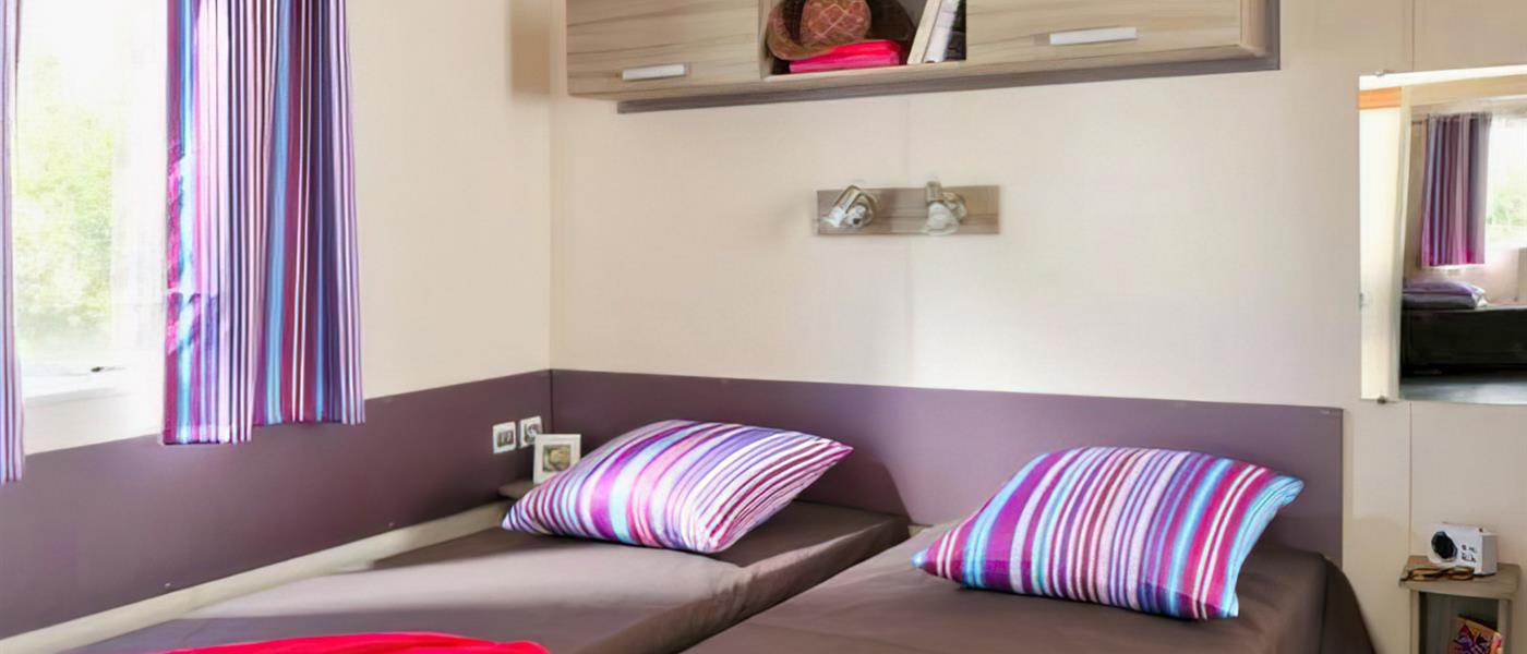 bedroom single beds Cottage Life 4/5 people - 32m² Camping La Roseraie - Camping La Roseraie