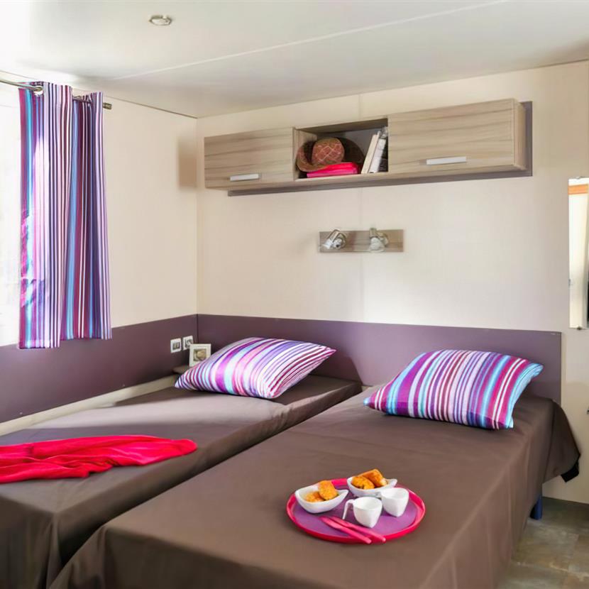 bedroom single beds Cottage Life 4/5 people - 32m² Camping La Roseraie - Camping La Roseraie